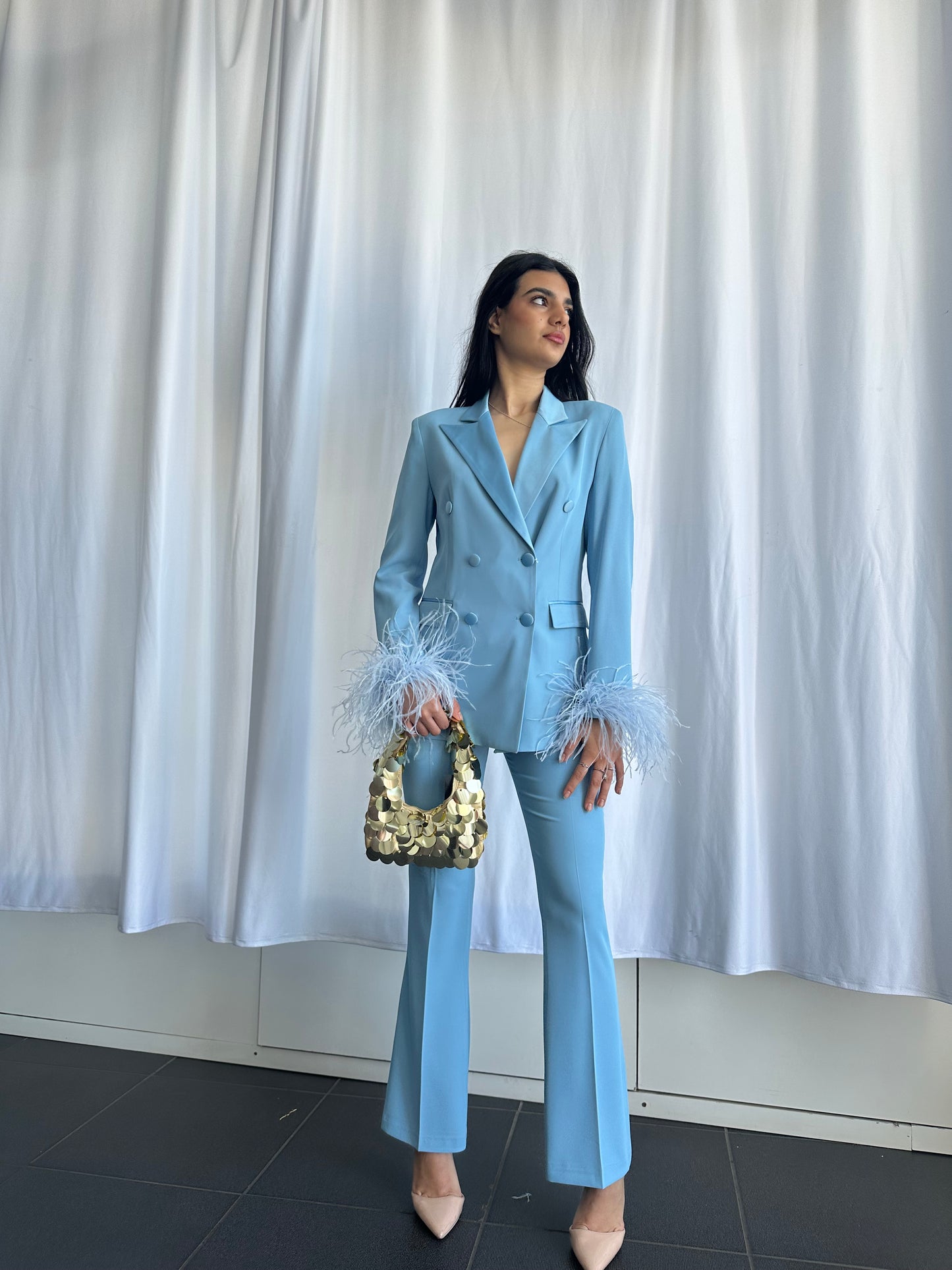 Tailleur con piume