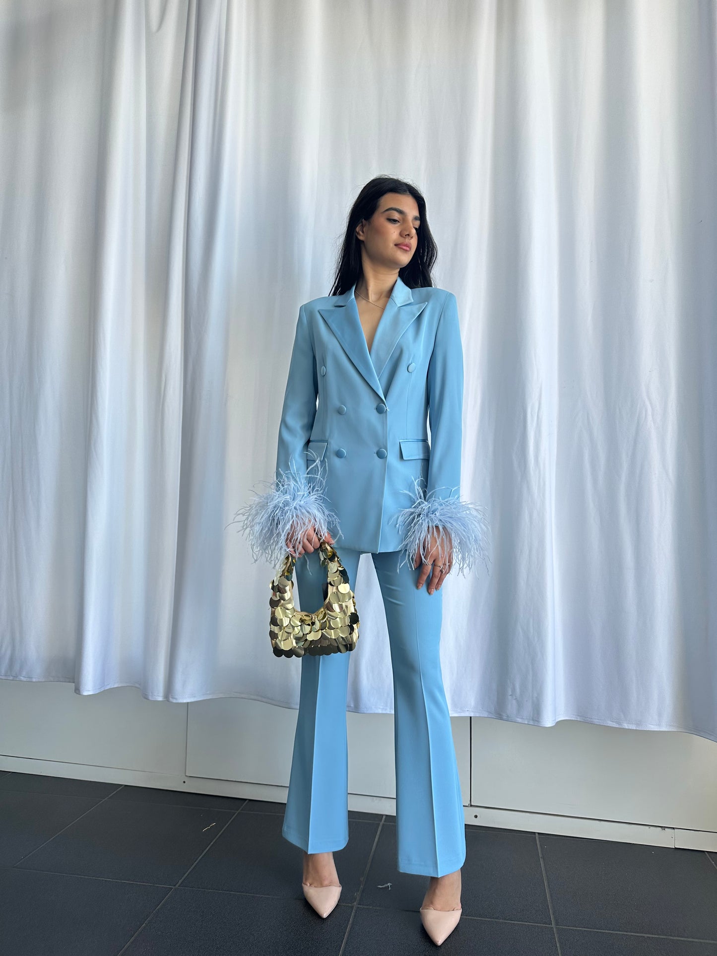 Tailleur con piume
