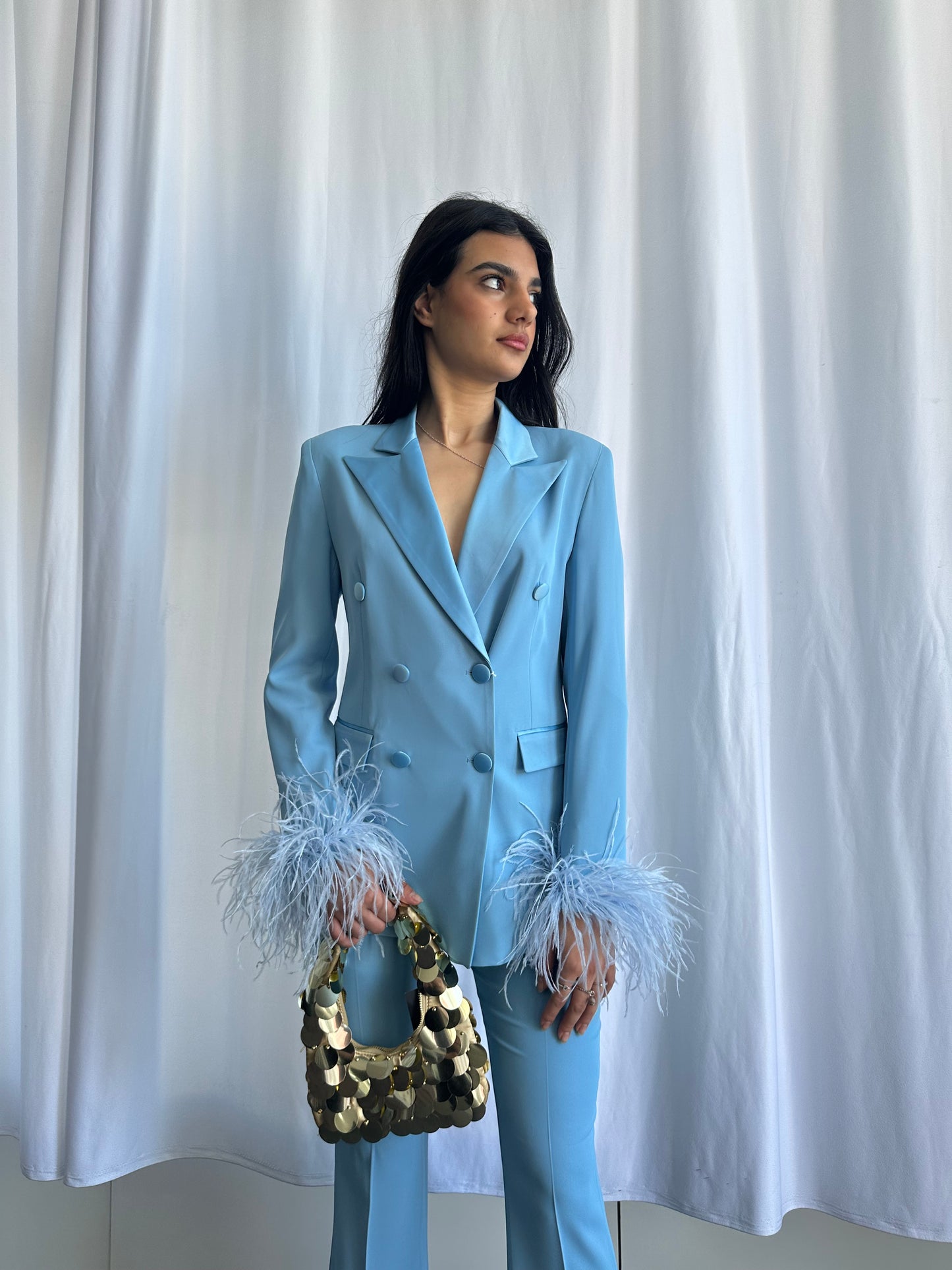 Tailleur con piume